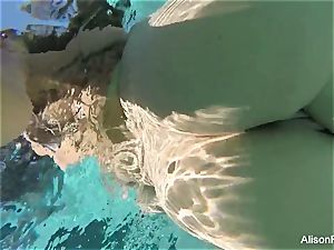 curvy Alison swims and strokes in the pool